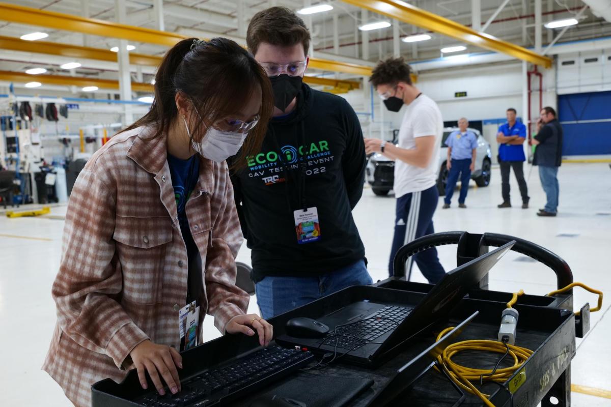 Joyce Zhao and Nick Hummel work on the car's connected and autonomous vehicle algorithms.