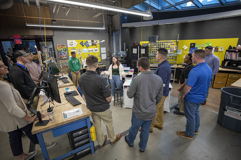 A student leader gives a tour of the Flowers Invention Studio. (Credit: Sean McNeil)