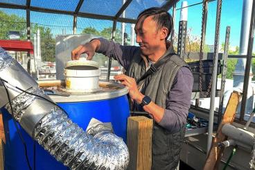 David Hu and his students run an experimental composting unit within a greenhouse on top of a building on Georgia Tech's campus. 