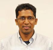 Fundamental Understanding of Oxide Nuclear Fuels Using Atomistic Simulations