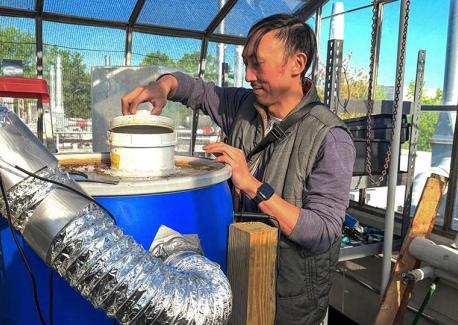 David Hu and his students run an experimental composting unit within a greenhouse on top of a building on Georgia Tech's campus. 